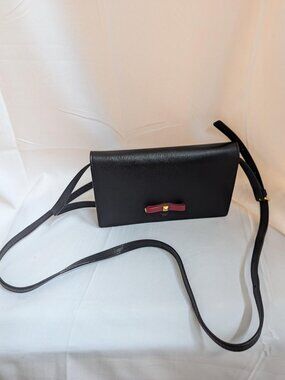 MCM Small Black with Red and Gold Bow Accent Clutch with Crossbody Strap